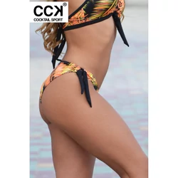 Kép 3/3 - Fekete-narancs pálma mintás, hagyományos fazonú, megkötős bikini alsó