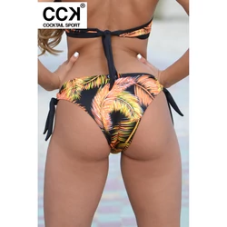 Kép 1/3 - Fekete-narancs pálma mintás, hagyományos fazonú, megkötős bikini alsó