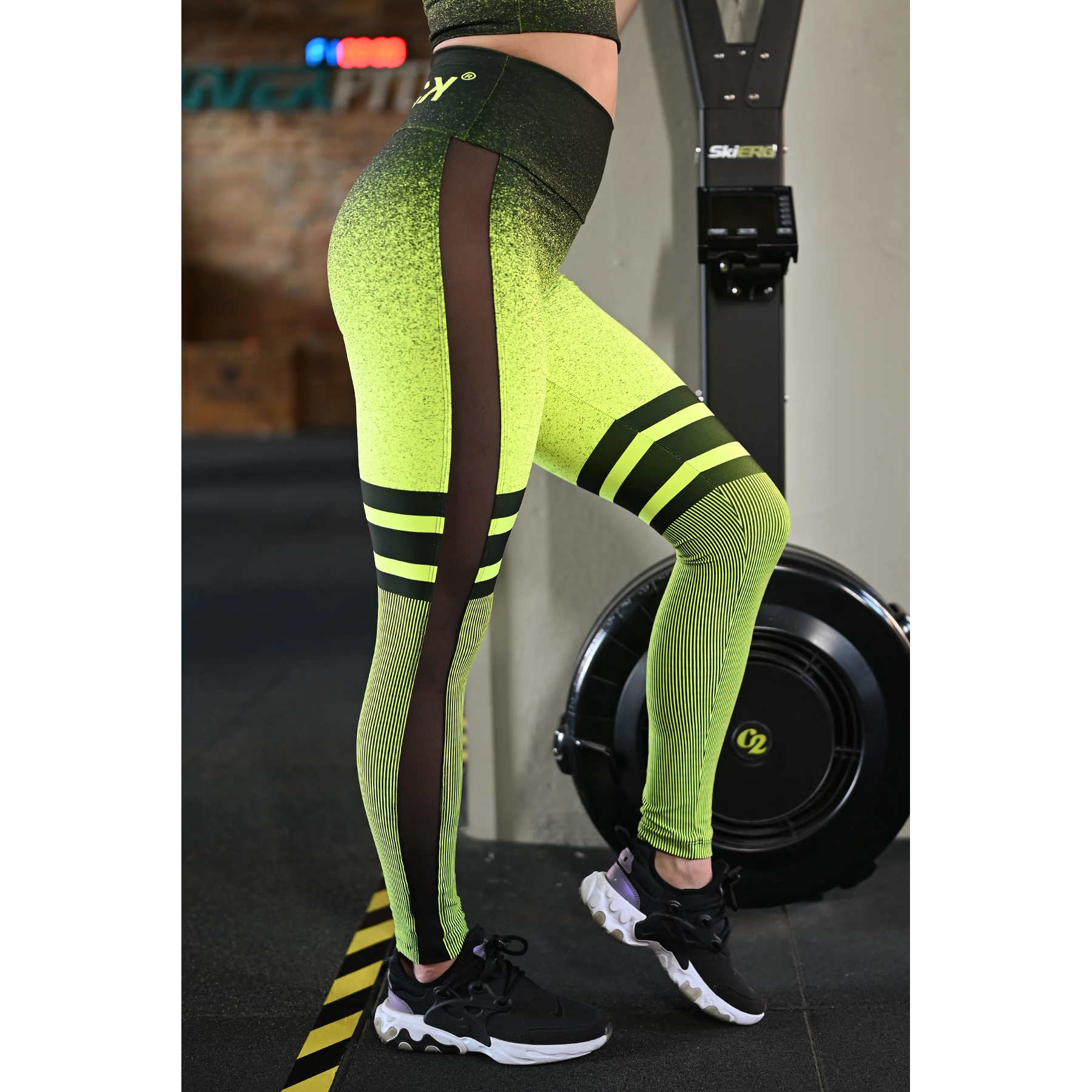 Melange neon sárga-fekete tüll betétes női fitnesz boka nadrág
